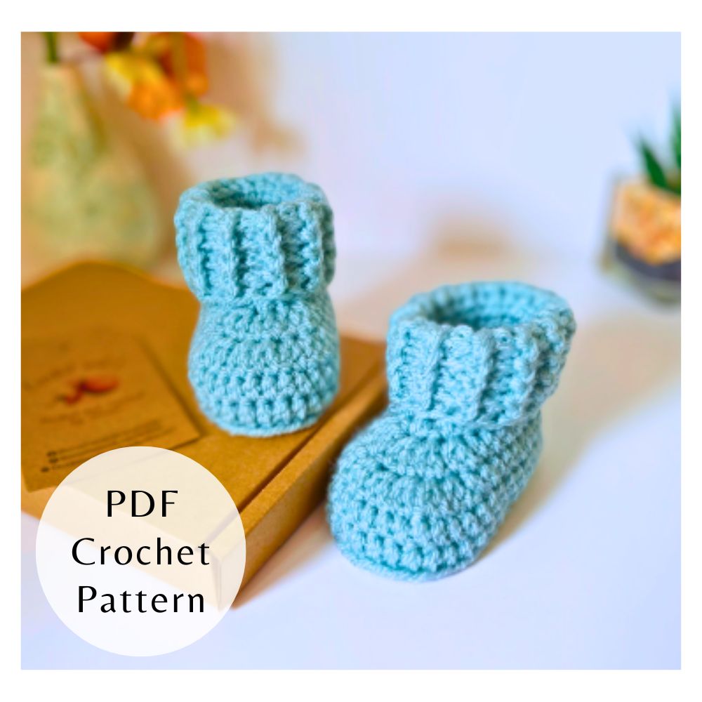 Handmade PDF Crochet Pattern Baby Booties With Ridged Cuff (Instant Download) – PDF pattern crafted in soft acrylic yarn and available in multiple colours by Twisted by the Sea.