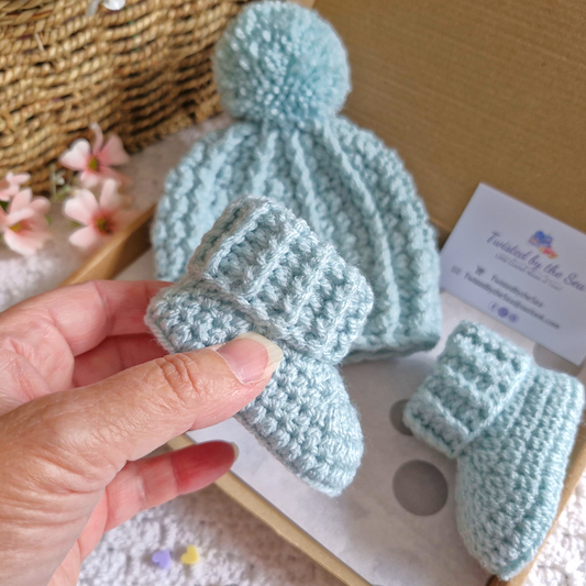 Handmade Newborn Baby Gift Set – Handmade Crochet Hat with Matching Booties – crafted in soft acrylic yarn and available in multiple colours by Twisted by the Sea.
