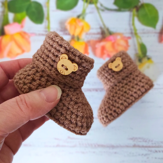 Handmade Handmade Crochet Baby Booties with Teddy Button - Sizes Newborn, 0-3 and 3-6 Months – Baby Booties crafted in soft acrylic yarn and available in multiple colours by Twisted by the Sea.
