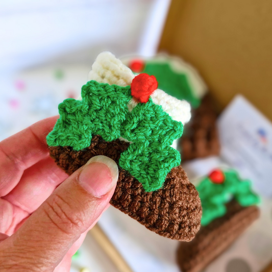 Handmade Christmas Pudding Baby Booties – Handmade Crochet Gift for Newborns – Baby Booties crafted in soft acrylic yarn and available in multiple colours by Twisted by the Sea.