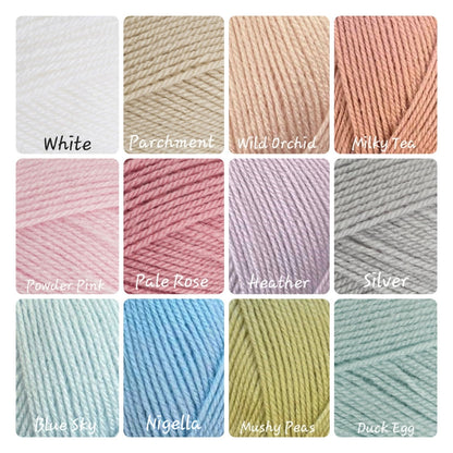 A 12-color yarn swatch chart showing 3x4 samples of different yarn colors with their names printed below: White, Parchment, Wild Orchid, Milky Tea, Powder Pink, Pale Rose, Heather, Silver, Blue Sky, Nigella, Mushy Peas, and Duck Egg.